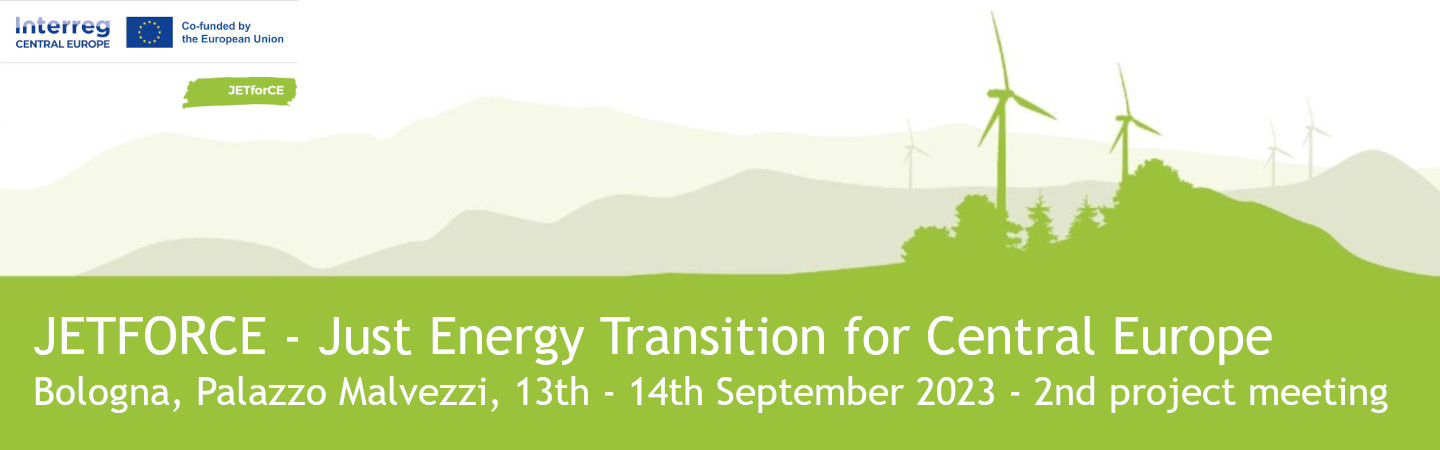 Banner advertising the JETforCE - Just Energy Transition for Central Europe meeting. Depicting wind turbines in distant fields, all in shades of green.