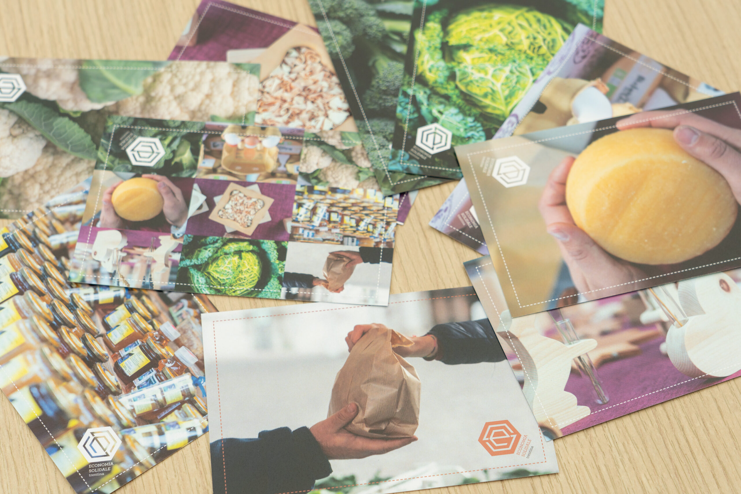 cards on a table with images of local prodocts