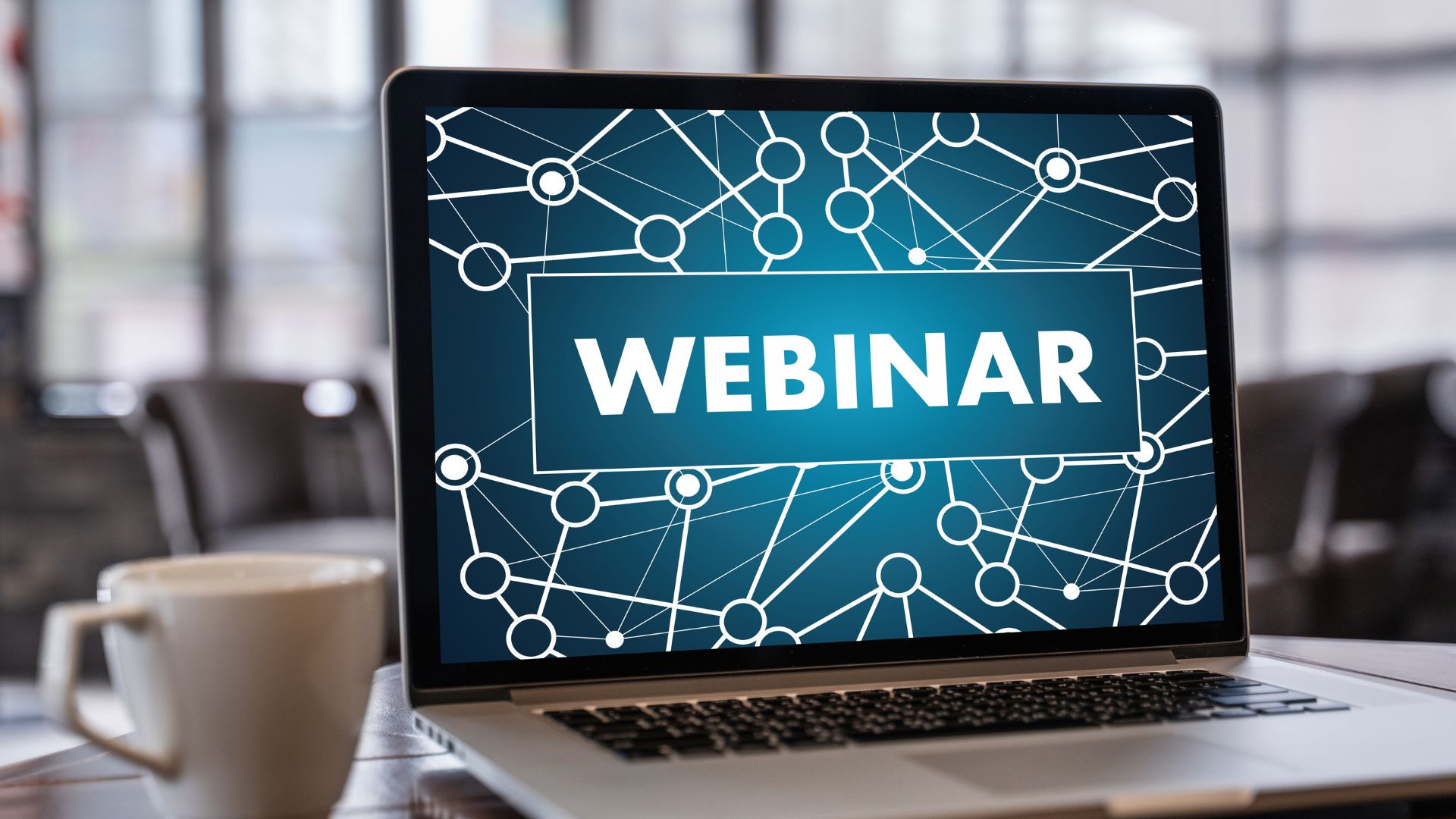 Webinar showing on the laptop screen