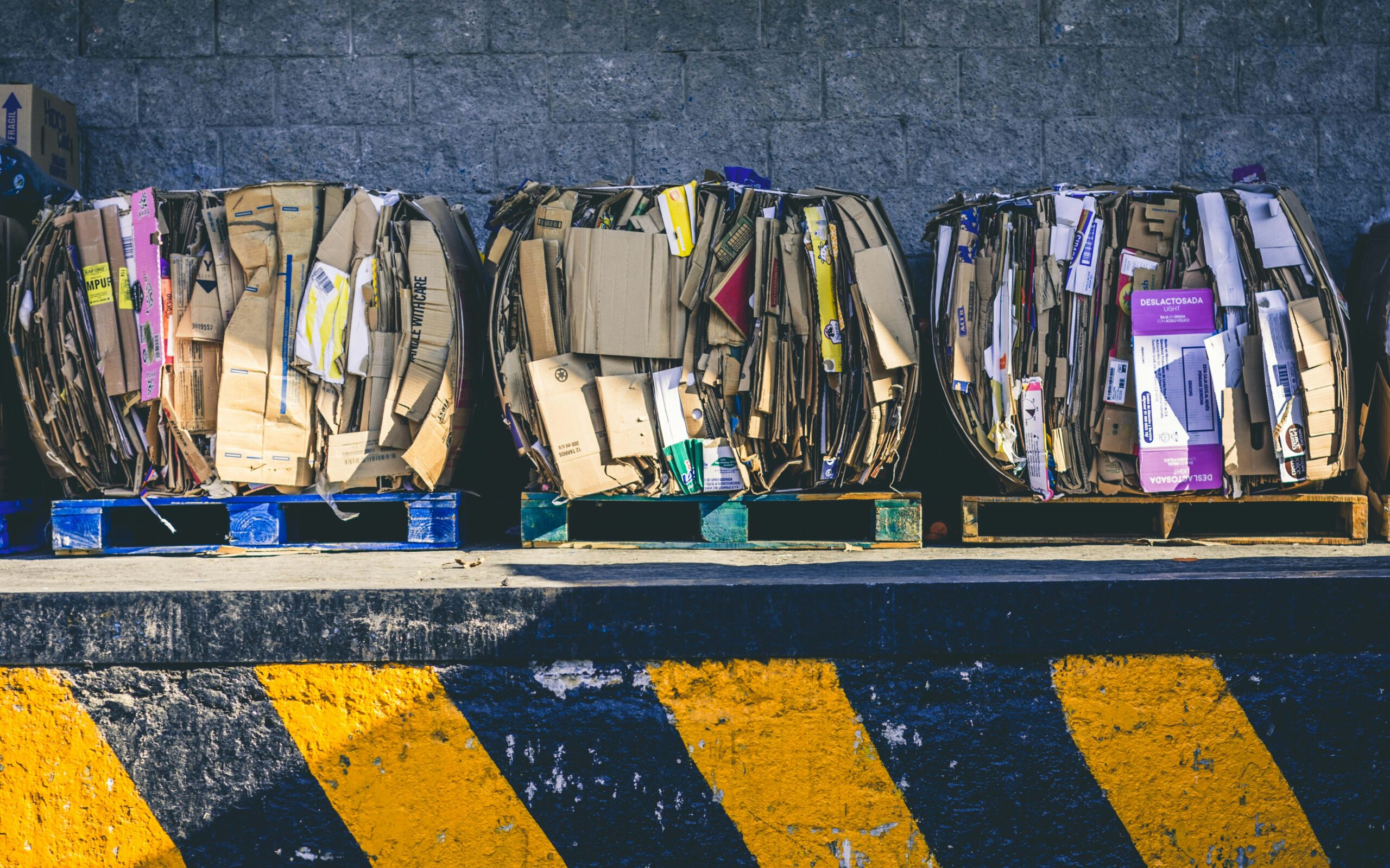 assorted-box-lot-on-brown-wooden-pallets