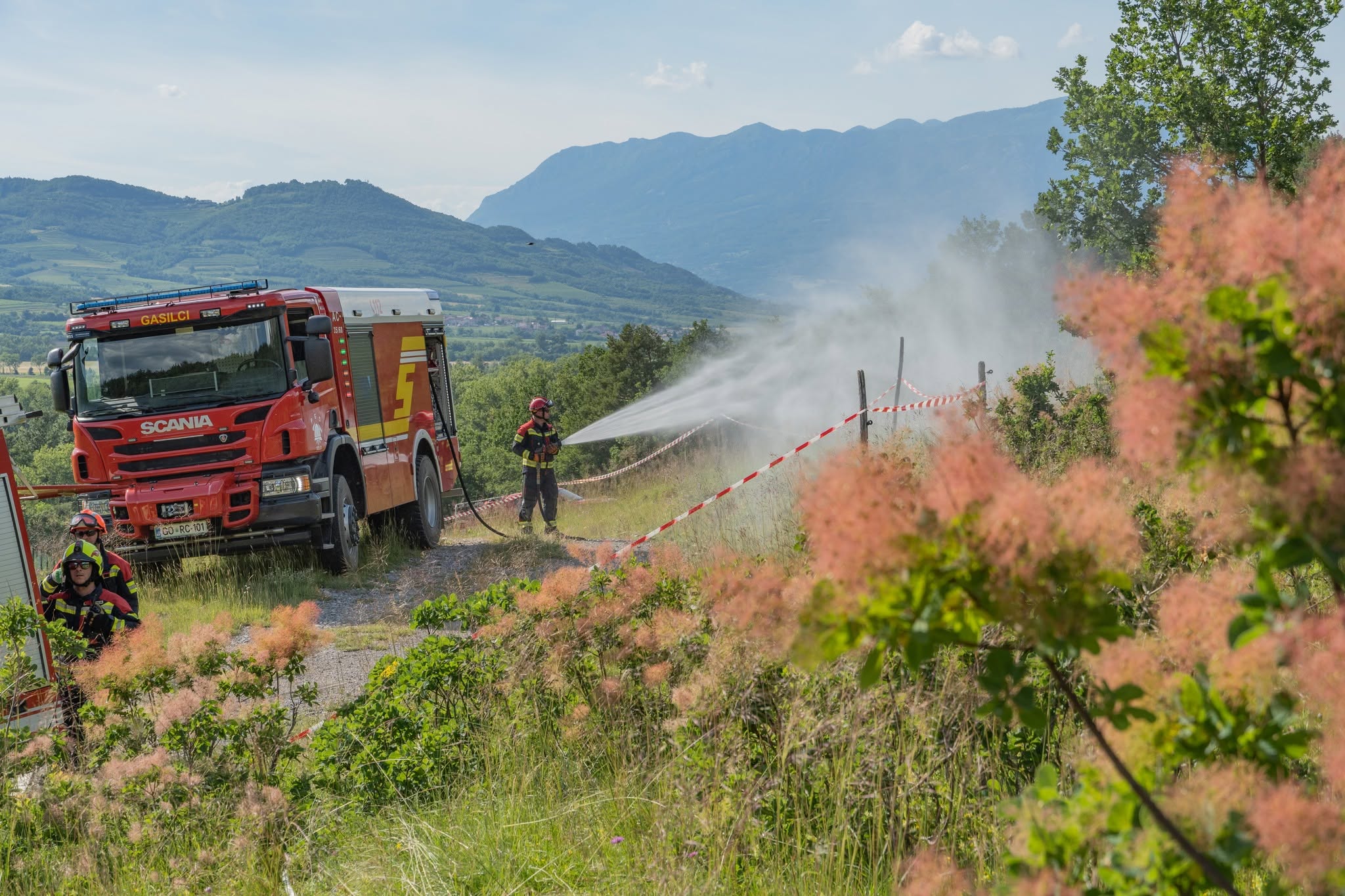 Firefighters extinguishing the fire