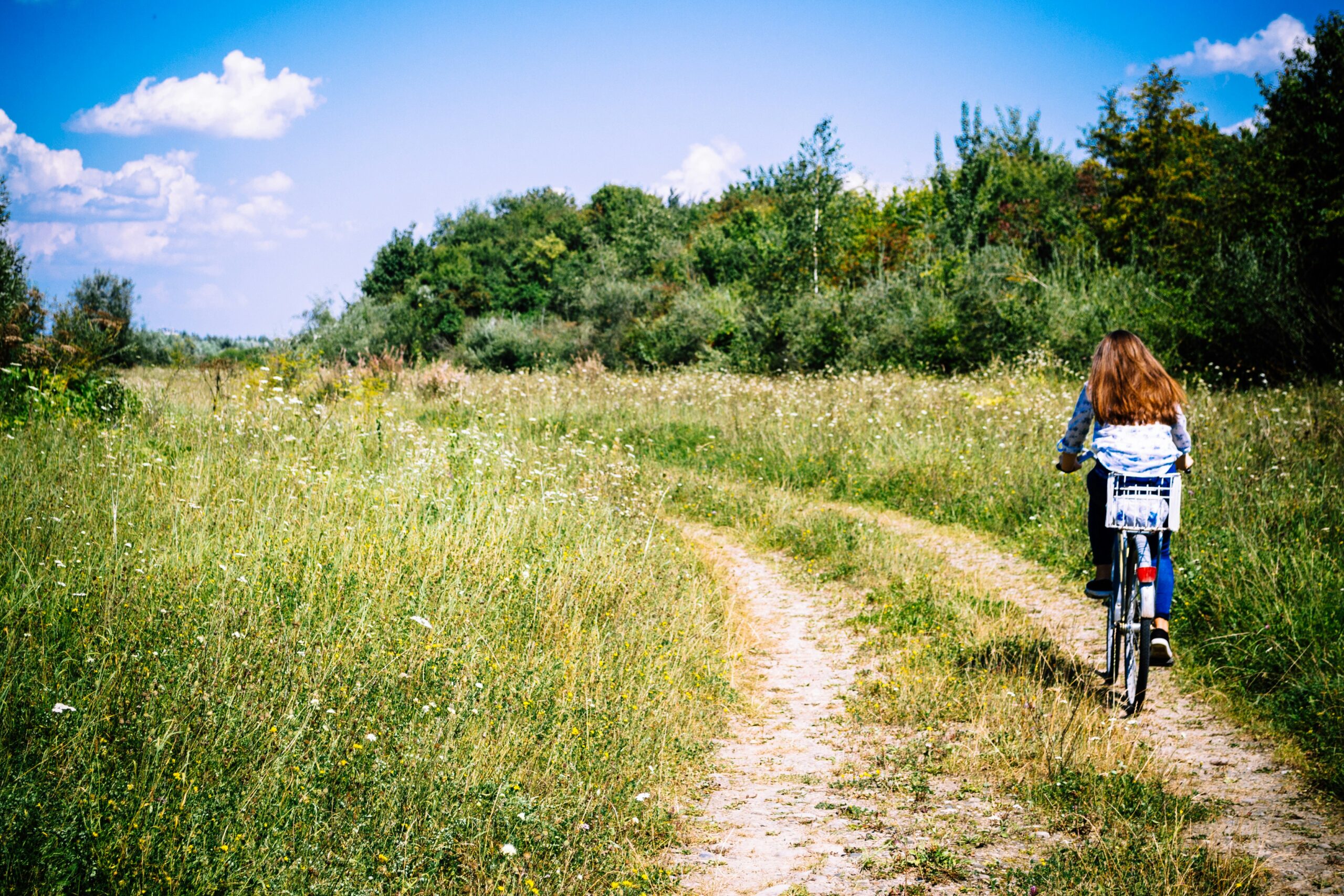 Person riding bicykle in countryside